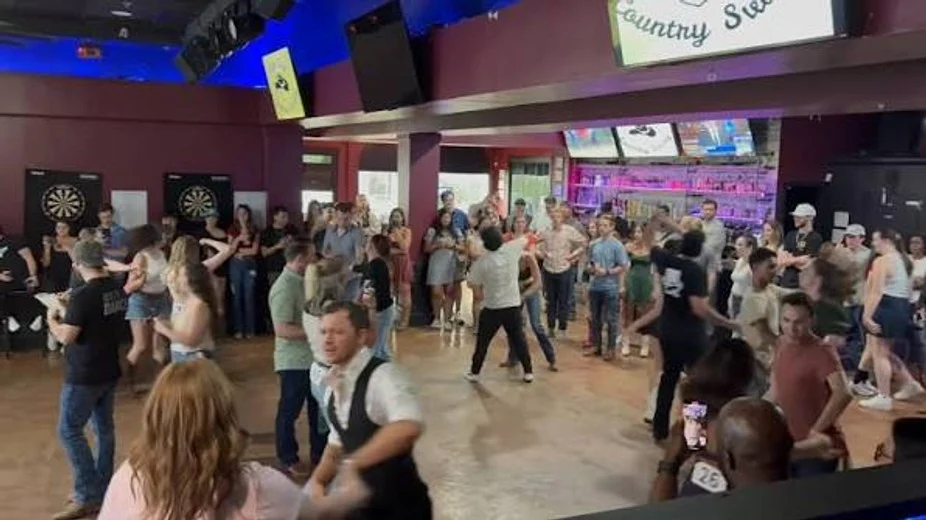 People swing dancing